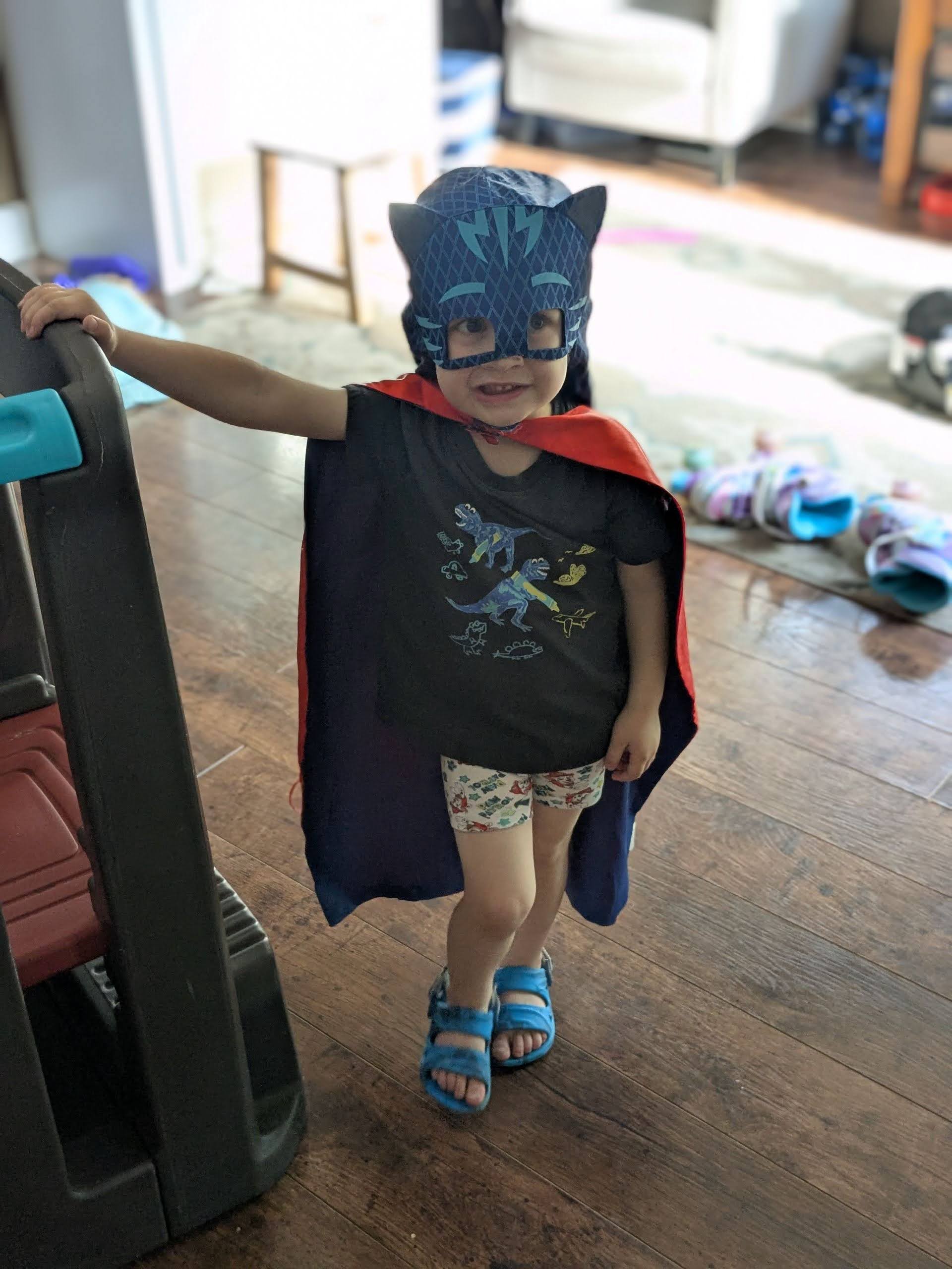 Oscar dressed as a superhero